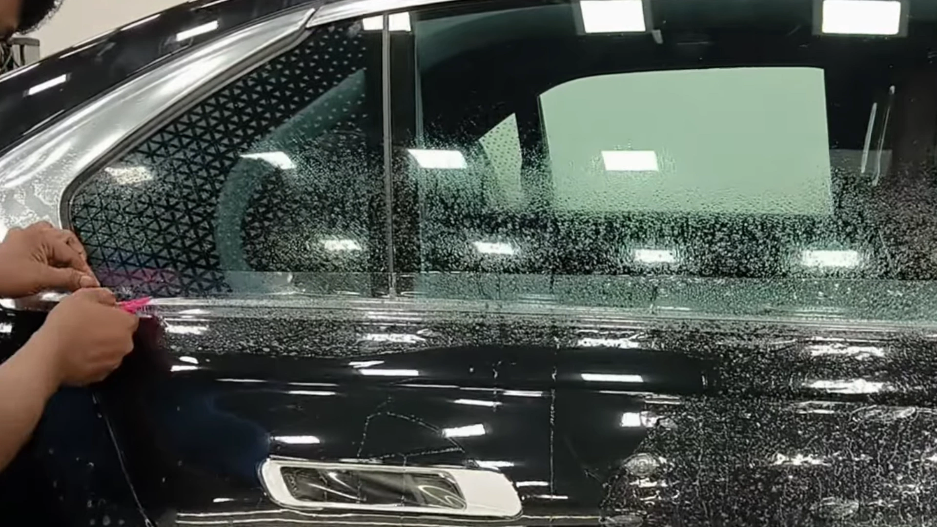 Paint protection film installation on a car in Hyderabad