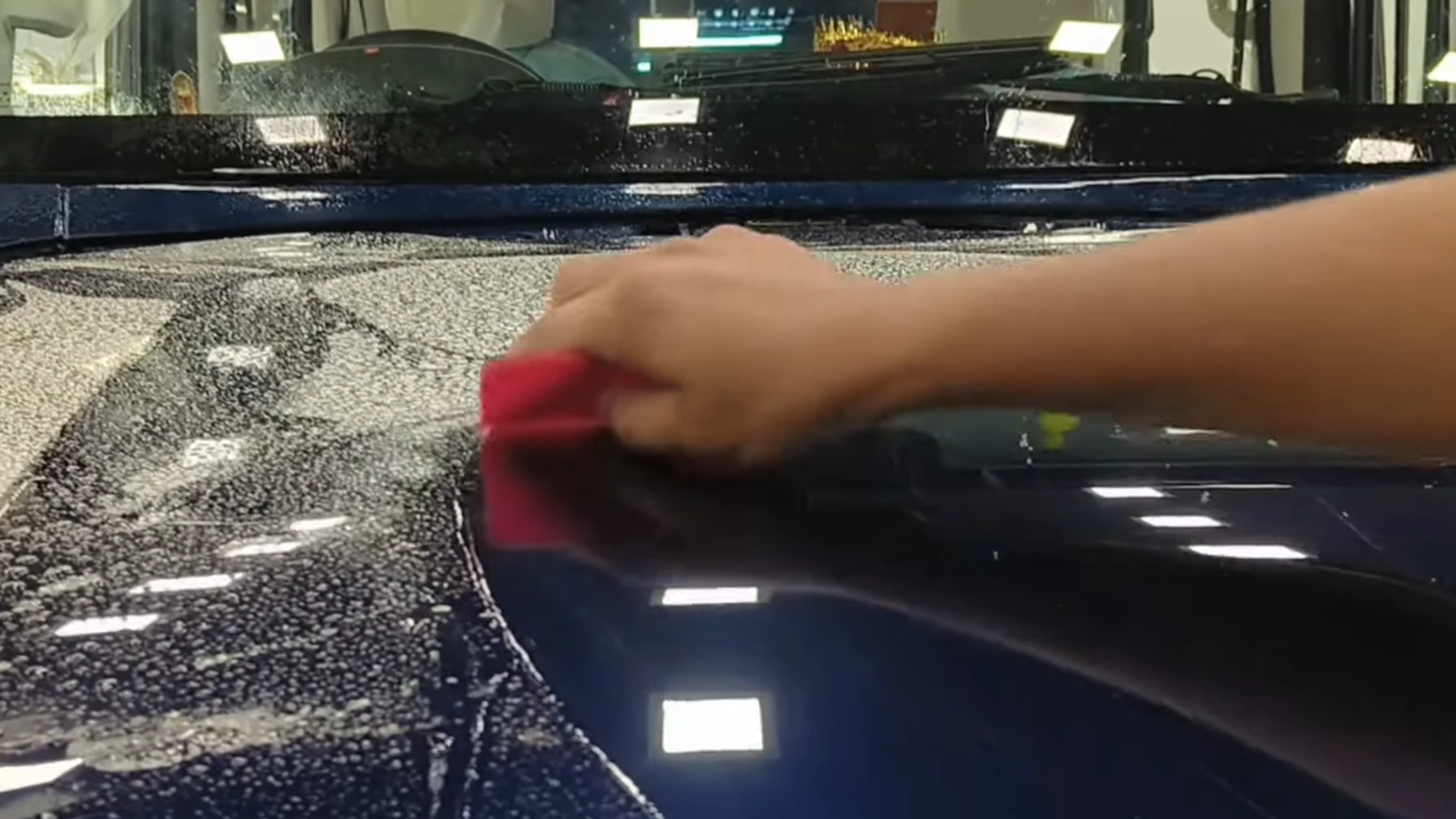 Squeegee finishing process during Paint Protection Film installation